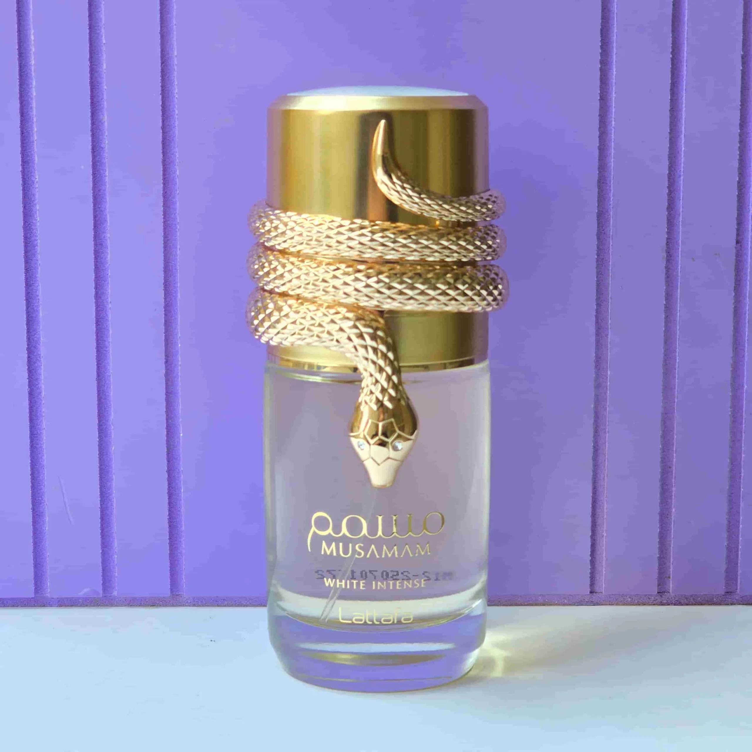 ادکلن زنانه مسمم وایت اینتنس سفید لطافه 100 میل2 ادکلن زنانه مسمم سفید اینتنس لطافه 100 میل